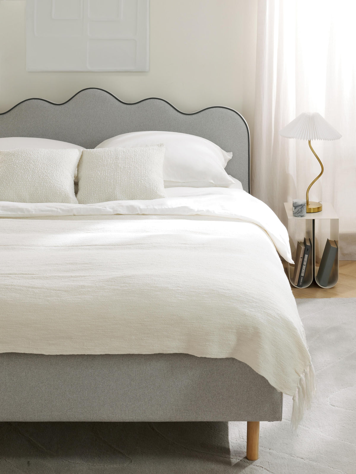 Romarra Upholstered Bed with Wavy Headboard