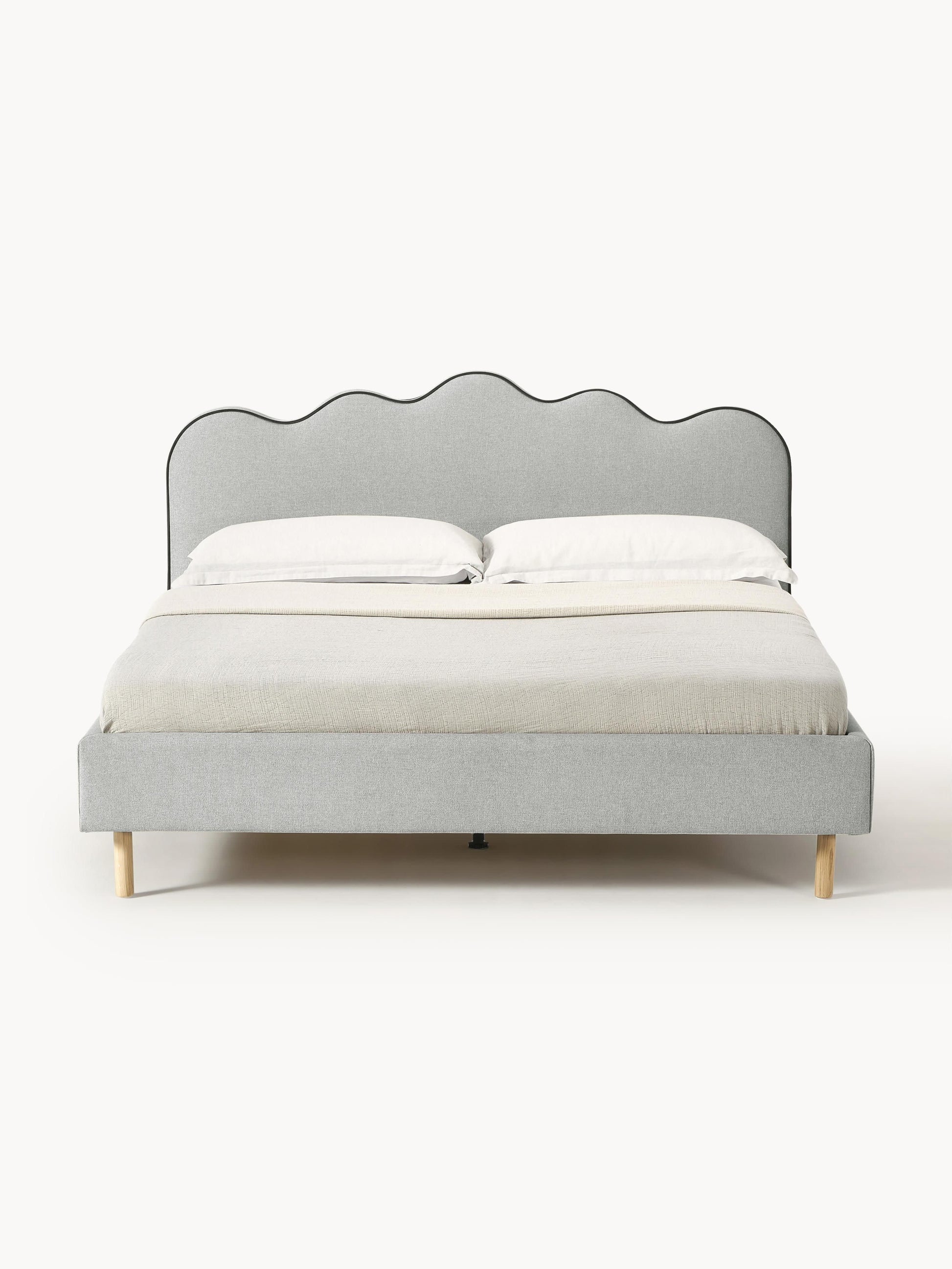 Romarra Upholstered Bed with Wavy Headboard